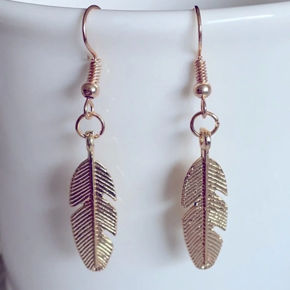 Gold leaf dangle earrings